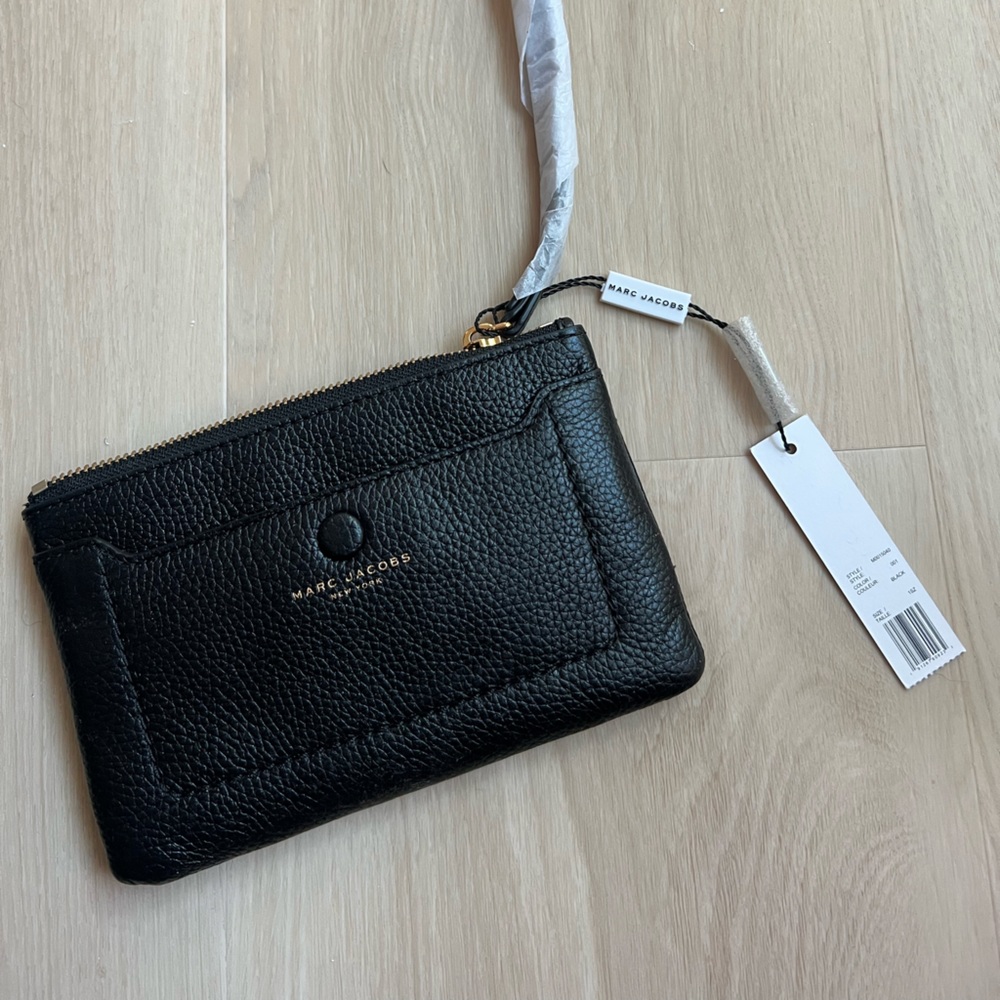 Marc Jacobs wallet/wristlet.Brand new never used, still has protective wrapping.